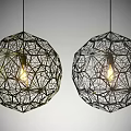 Modern Spherical Chandeliers With Black Metal Frame And Illuminated Bulbs On Gray Background