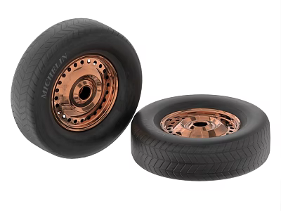 Two Black Car Tires with Copper Colored Rims and Classic Tread Design 3d model