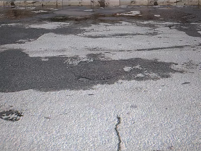 Damaged Asphalt Pavement With Visible Cracks And Potholes On Surface 3d model