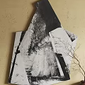 Abstract Black And White Painting On Beige Wall With Ceramic Vase And Bare Twigs