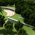 Scenic Park Landscape With Lush Green Trees Palm Trees Winding Paths And Grass Lawns