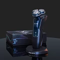 Philips Electric Shaver With Three Blade Heads On Charging Stand And Packaging Box