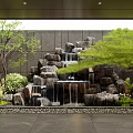 Tranquil Courtyard Garden with Rock Waterfall Lush Trees Ferns Gray Stone Wall and Stone Pathway