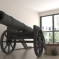 Black Cannon With Large Wheels In Room Next To Wooden Crate And Cannonball
