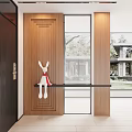 Modern Entryway Hallway Interior with Wooden Door Glass Partition and Rabbit Decor with Red Scarf