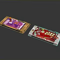 Two Colorful Handheld Electronic Devices With Pink Gold And Red White Panels And Buttons