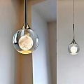Stylish Modern Spherical Metal Pendant Light With Warm Illuminated Glow For Home Interior