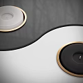 Yin Yang Shaped Device With Black And White Sections And Circular Components