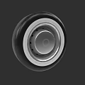 Car Tire Featuring Black Rubber And Silver Metallic Hub Design Details