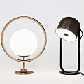 Two Modern Table Lamps Featuring Circular Frame And Tilted Lampshade Design
