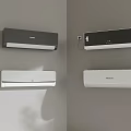 Four Black and White Haier Air Conditioners Mounted on Gray Wall