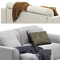 Cream And Light Gray Two Seater Sofa With Colorful Pillows And Soft Blankets
