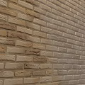 Natural Rustic Brown Brick Wall Surface With Warm Textured Pattern And Organic Design