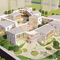 Modern Multi Story School Campus Buildings With Central Courtyard Open Space Greenery And Trees