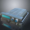 Industrial Computer Unit with Metal Casing Ventilation Grilles Blue Ports Display Screen and Control Knob