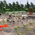 Military Model Scene With Soldiers Cannons Red Airplane And Green Trees