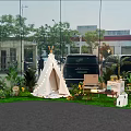 Outdoor Flower Arrangement Decor With White Tent Green Plants Lawn And Decorative Items