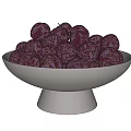 Abundant Dark Purple Plums in Light Gray Stone Bowls Looking Fresh and Ripe