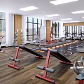 Spacious Fitness Gym With Workout Equipment Large Windows And Wooden Floors