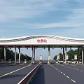 Highway Toll Station With Multiple Lanes Covered Roof And Trees Under Blue Sky