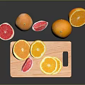 Fresh Whole And Sliced Oranges With Grapefruits On Wooden Cutting Board
