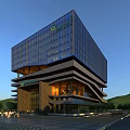 Modern Office Building With Glass Facade Multi Level Structure And Trees Around Sunset View