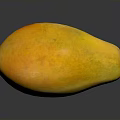Ripe Yellow Mango on Dark Surface with Reflection