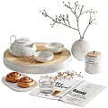 Elegant White Ceramic Tea Set With Teapot Bowls On Bamboo Tray And Cinnamon Rolls