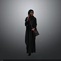 Woman in Black Abaya and Hijab Holding Small Handbag Against Gray Background
