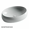 Modern White Oval Washbasin With Sleek Surface And Countertop Design