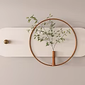 Decorative Wall Hanging With White Oval Panel Golden Hook Wooden Hoop And Green Plant