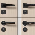 Black Modern Door Handles With Lock Plates On Light Wood Doors