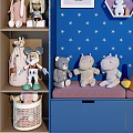 Stuffed Dolls Display With Blue Starry Background And Hexagon Display Frames On Shelves