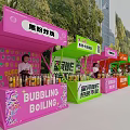 Colorful Mobile Food Carts Selling Fried Chicken Drinks And Spicy Skewers On Street