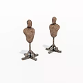 Two Burlap Covered Mannequin Torsos On Metal Stands With Simple Design