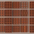 Brown Building Components with Various Hollow Patterns and Geometric Designs Neatly Arranged 3d model