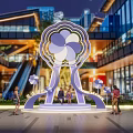 Eye Catching Flower Shaped Photo Spot In Urban Mall Courtyard With Illuminated Decor And Visitors