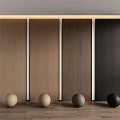 Vertical Wooden Wall Paneling with Four Color Tones Against White Wall and Wooden Floor