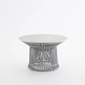Modern Outdoor Table With Round White Tabletop And Silver Metal Mesh Legs