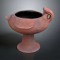 Traditional Terracotta Vessel With Bird Head Handle And Carved Patterns On Pedestal Base