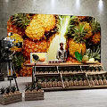 Commercial Equipment For Pineapple Product Display With Retail Setup And Photography Gear