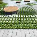Park Landscape Design With Stone Paved Path Circular Wooden Platforms Green Plants And Grass Patches