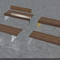 Outdoor Landscape Seats With Wooden Surfaces And Metal Frames On Paved Ground
