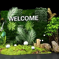 Welcome Natural Decor Scene With Lush Green Plants White Spheres And Stones