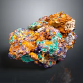 Vibrant Colored Stone And Wood Specimen Featuring Orange Green Blue Purple Tones And Label Tag