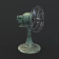 Vintage Electric Fan with Metal Cage Worn Green Base and Retro Design