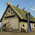 Medieval Building With Thatched Roof Stone Walls Shields Axe Barrels And Flag