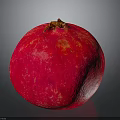 Fresh Red Pomegranate With Shiny Surface And Whole Ripe Fruit