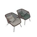 Modern Accent Chairs With Rattan Weave Design And Striped Green Cushions On Metal Legs