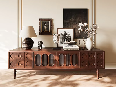 Vintage Wooden TV Stand With Circular Accents Glass Doors And Decorative Items On Top 3d model